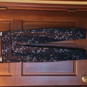 Lilly Pulitzer Black with Siler and gold sparkle leggings.